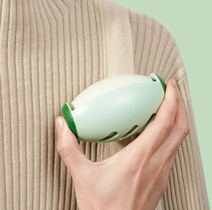 Using Pocket Roller to remove lint and pet hair from sweater fabric