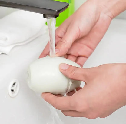 Demonstrating lint removal from white shirt using Pocket Roller